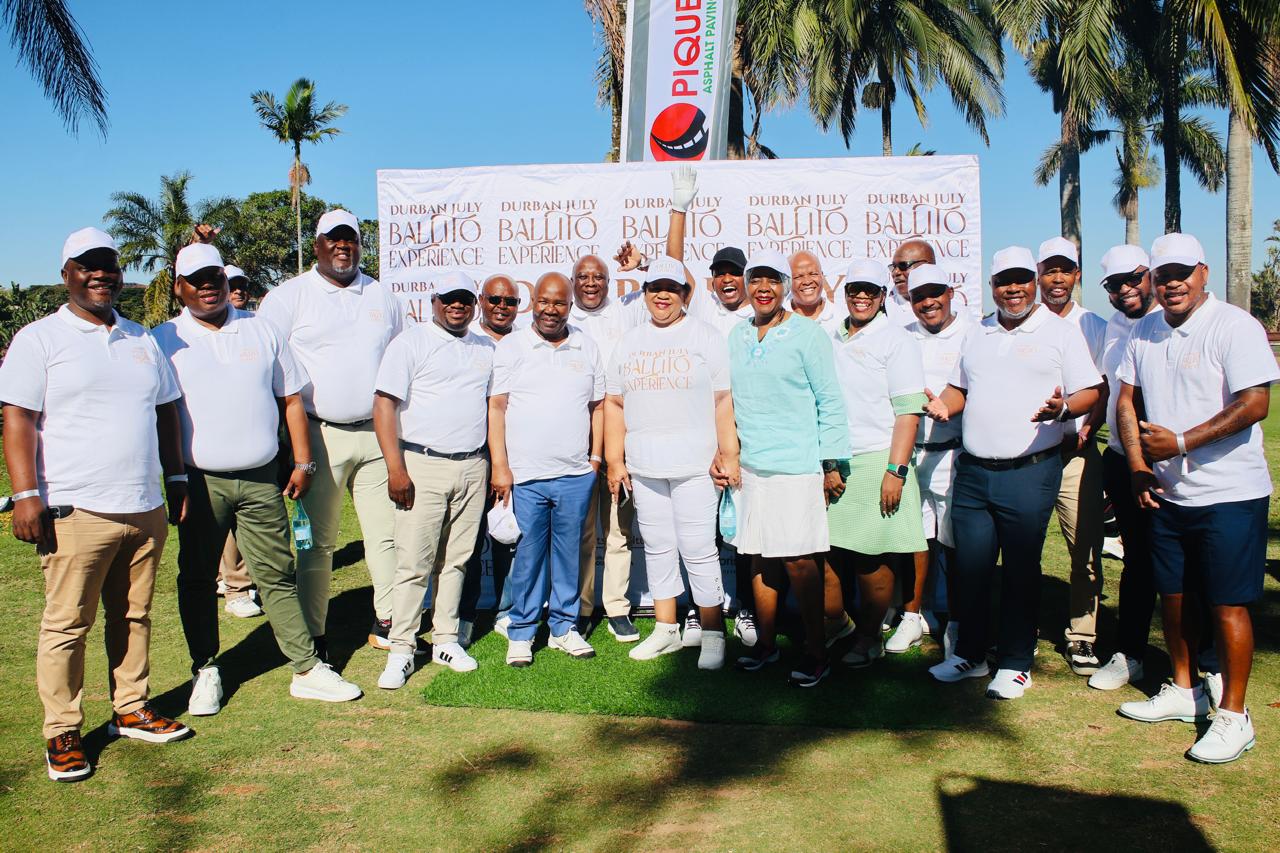 2nd Annual Enterprise iLembe Ballito July Experience Golf Day group photo at the wall banner